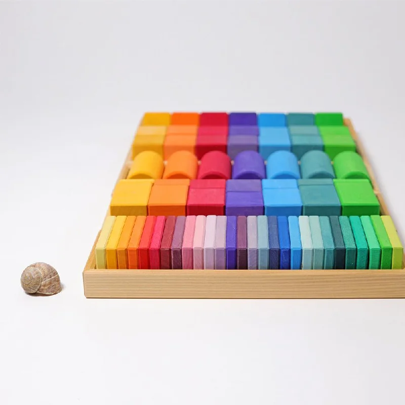 Hand - Turned Wooden Spinning Top with a Colorful Design for Classic AmusementGrimm's shapes and colours set Hand - Turned Wooden Spinning Top with a Colorful Design for Classic AmusementGrimm's shapes and colours set