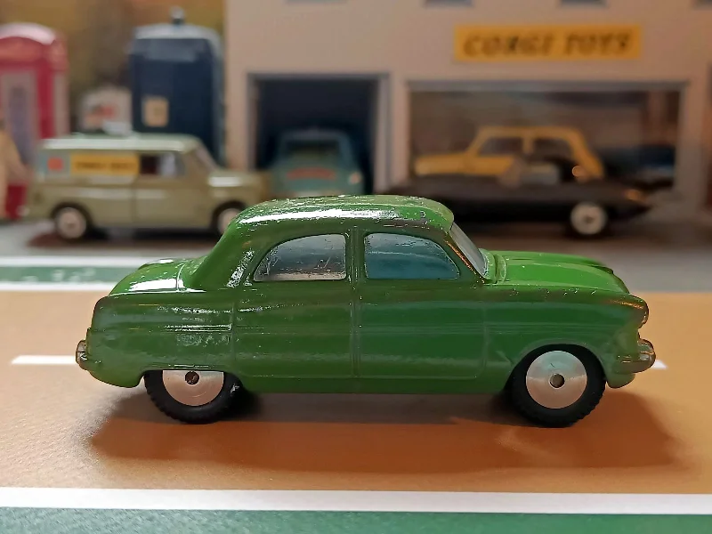 Slot Car Racing Set featuring Formula 1 Cars and a Multilane Track200M Ford Consul in green Slot Car Racing Set featuring Formula 1 Cars and a Multilane Track200M Ford Consul in green