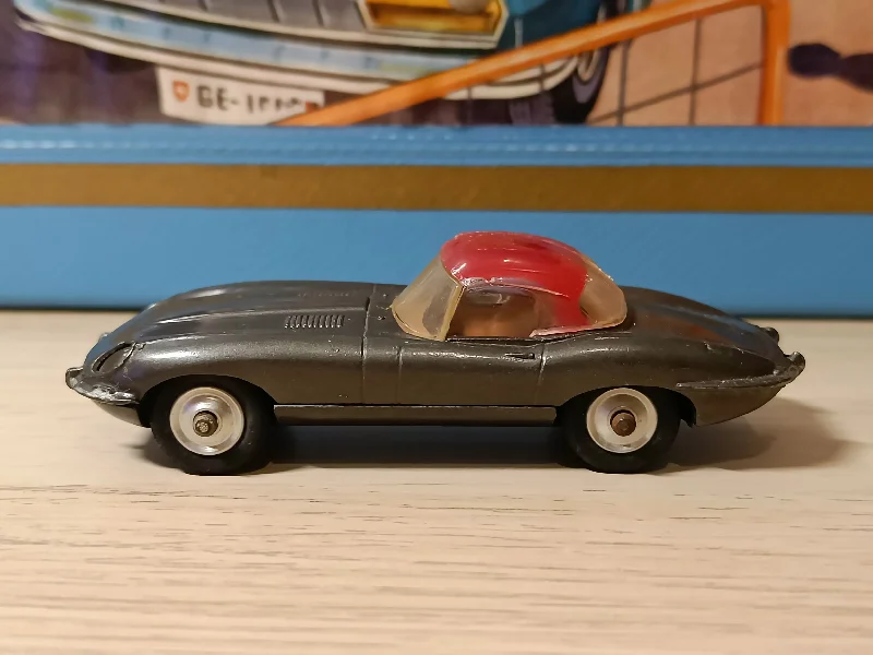 RC Monster Truck with Large - Scale Tires and a High - Torque Motor for Extreme Maneuvers307 Jaguar E Type in dark grey with original top 1