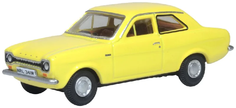 Collectible Train Set with a Steam Locomotive, Passenger Cars, and Track AccessoriesModel of the Ford Escort Mk1 Daytona Yellow by Oxford at 1:76 scale.