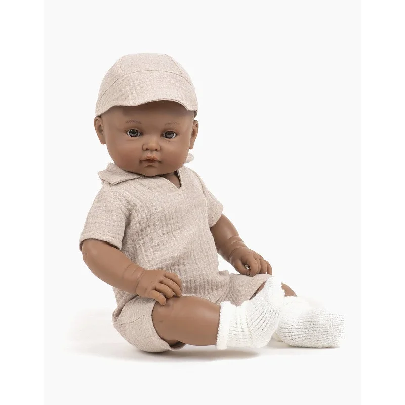 Dolls with a Braille - Embossed Nameplate and Sensory - Friendly AccessoriesMiniKane bambinis boy Augustin dressed in a tom Jumpsuit and beige double gauze cap