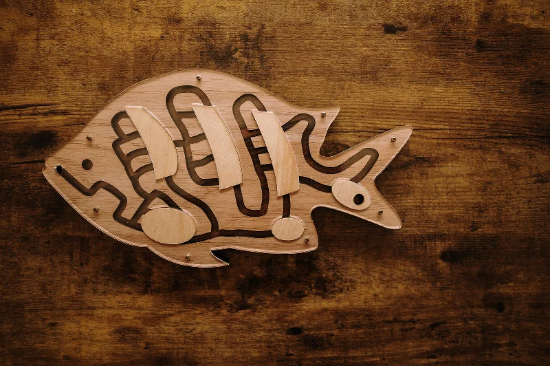 Eco - Friendly Sustainable Wooden Puzzles in Animal Shapes for Environment - Conscious ParentsFeed the Fish